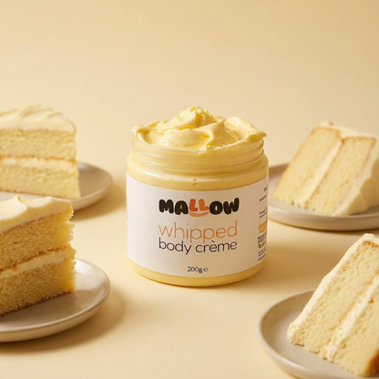Jar of Mallow Vanilla Butter Cream whipped body crème with slices of cake on a yellow background